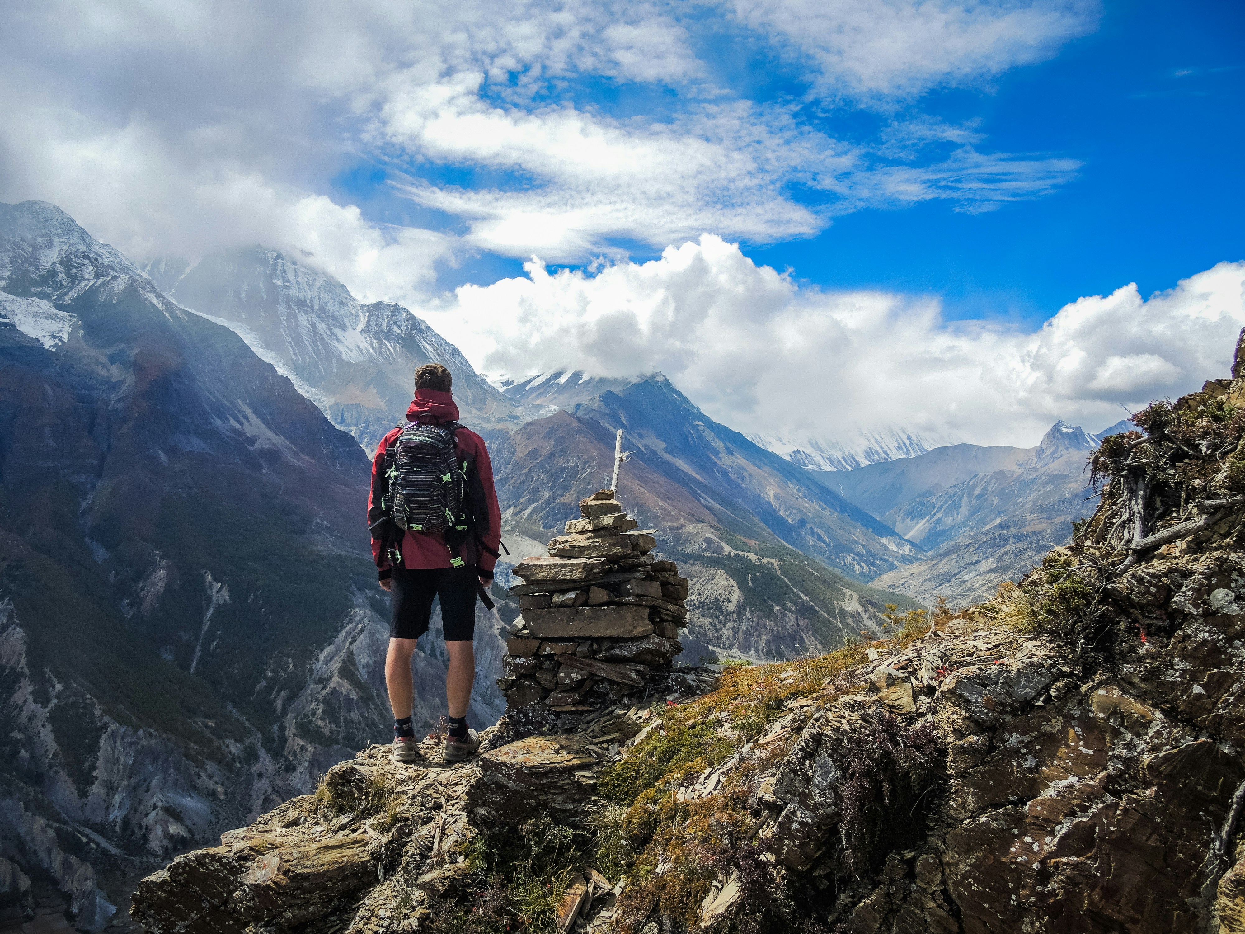 Traveler looking over a coastal city
