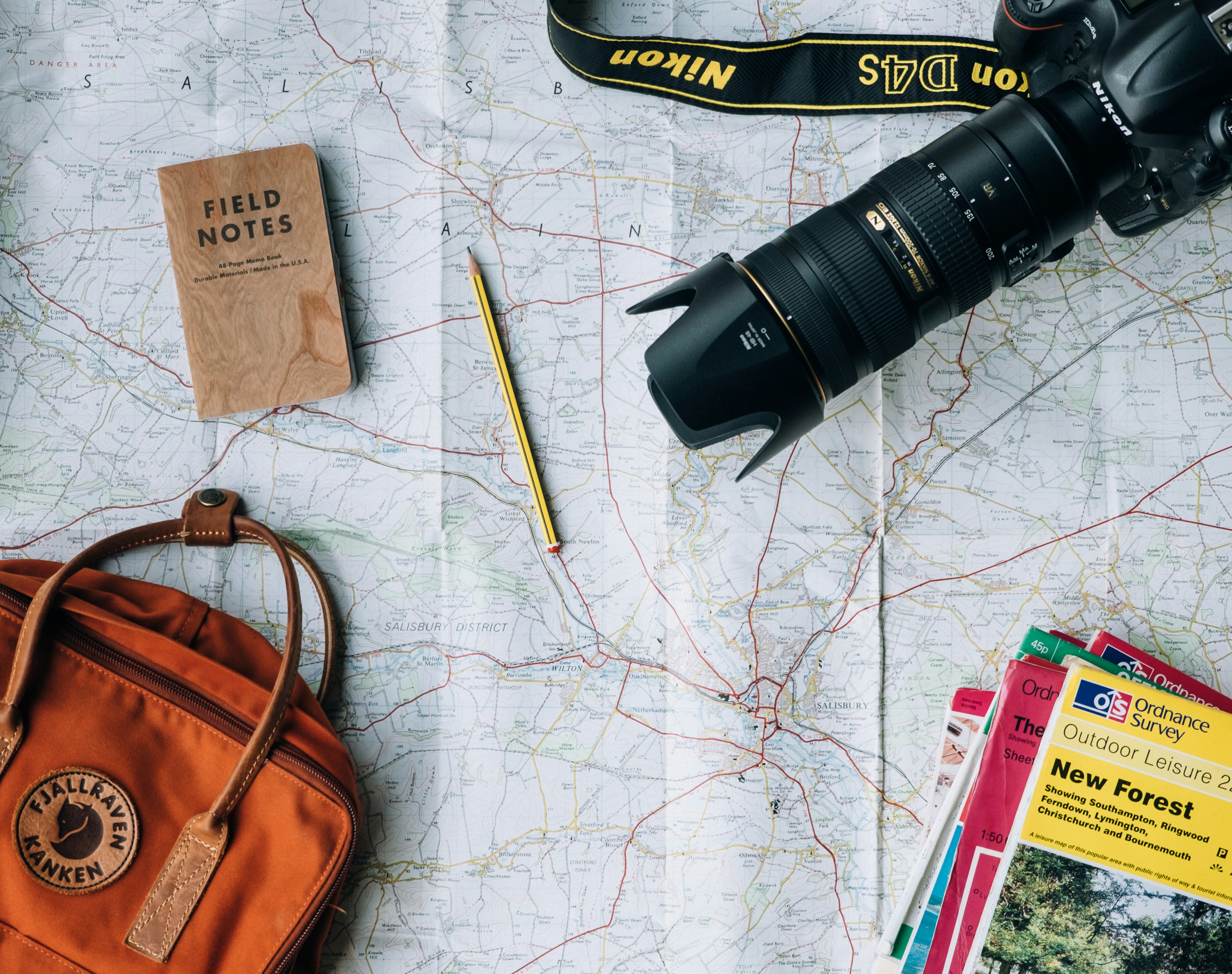 Travel map, camera, and planning notes