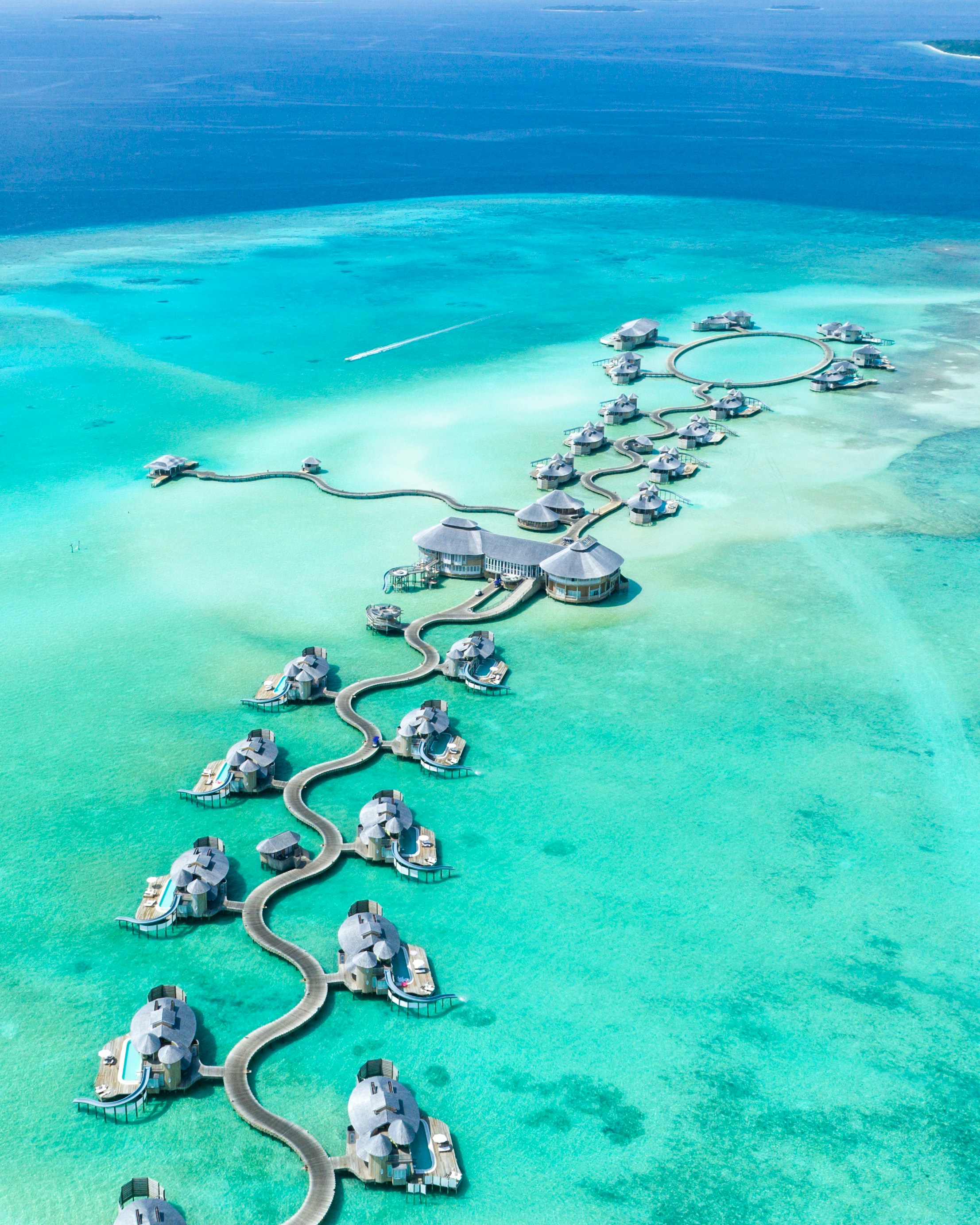 Overwater villas and turquoise lagoon in the Maldives