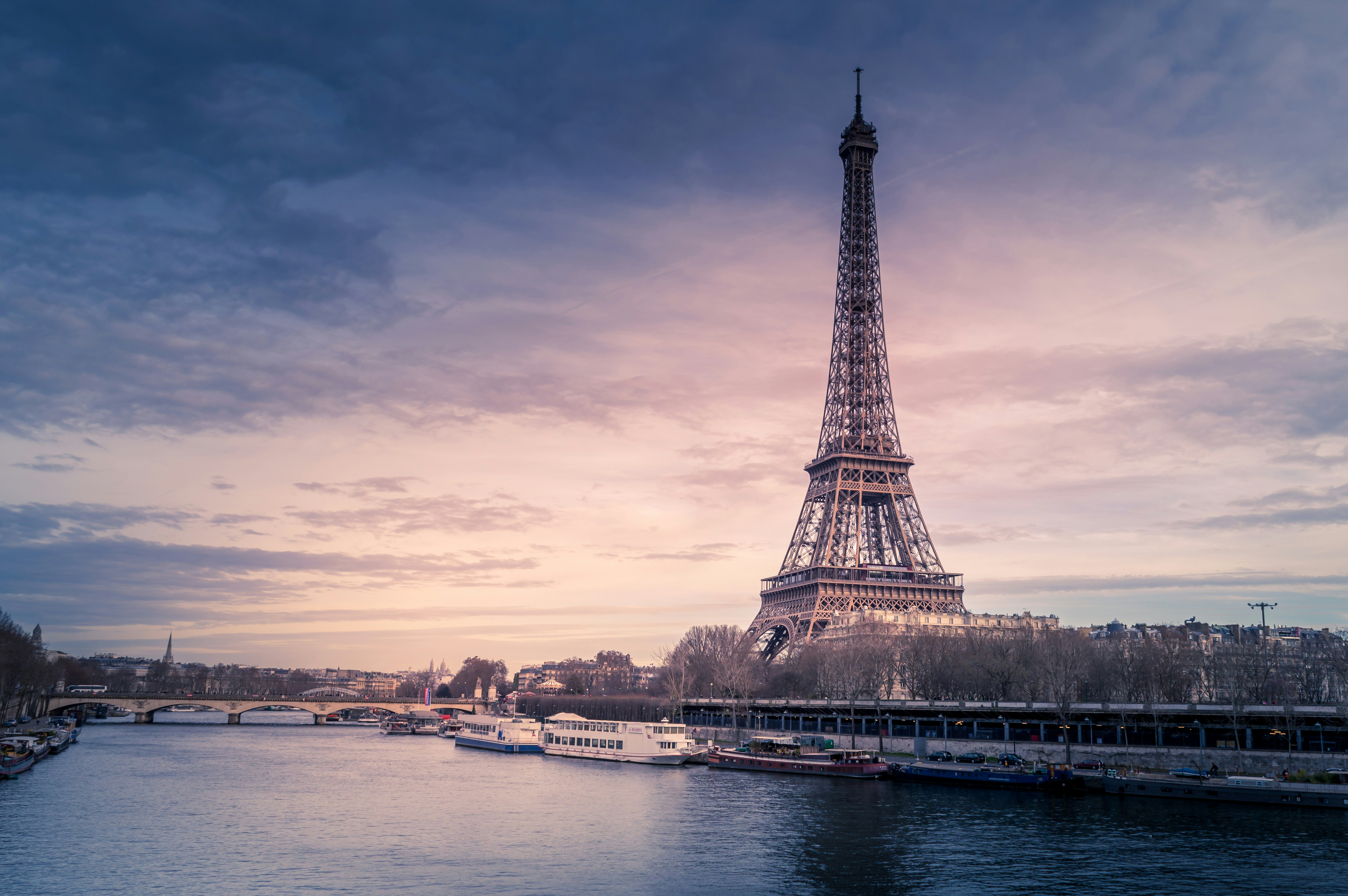 Paris street view with the Eiffel Tower in the distance